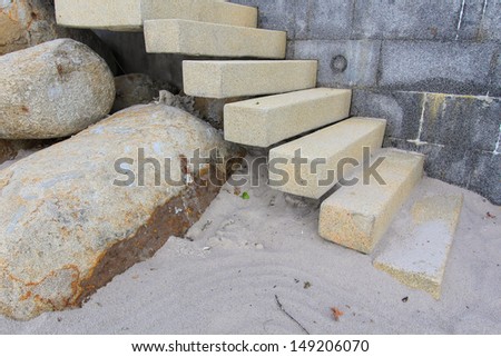 stone steps on beach to house