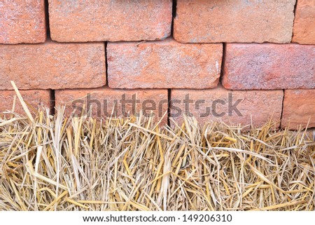 abstract straw texture with brick wallpaper