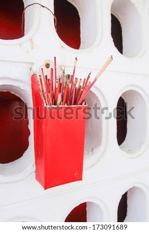 red box for incense sticks in a Chinese temple