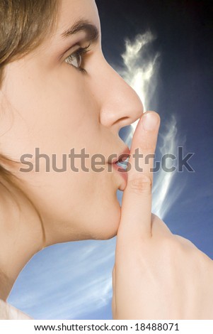 young girl portrait with finger in the mouth