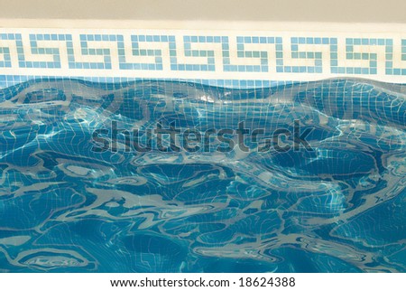 moving water in a swimming pool blue and white