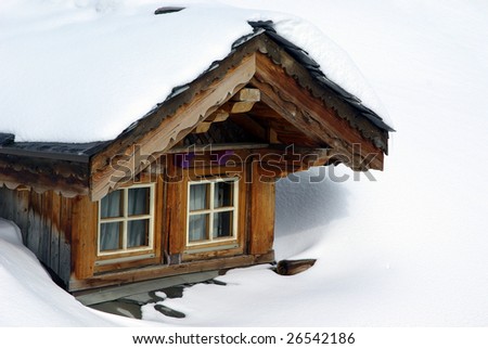 Bow-window of a chalet in a ski resort.