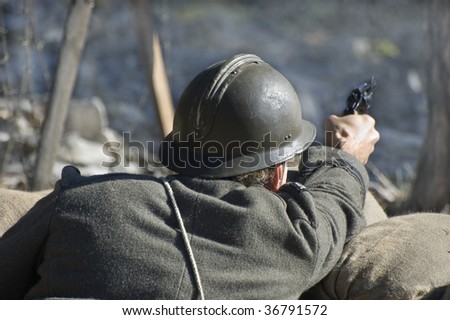 First World War soldier with gun shooting