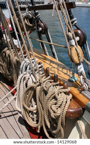 Closeup of ropes on the deck of an old-style ship