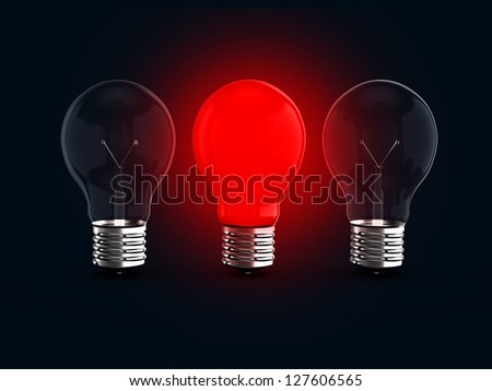 Red glowing light bulb lamp among two transparent light bulbs on dark background.