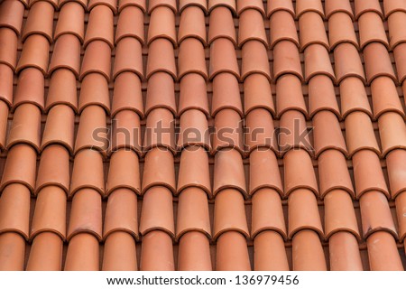 Roof tiles background texture in regular rows.