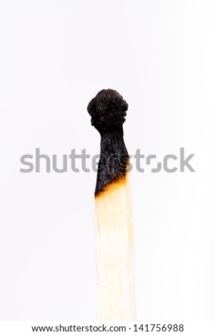 Single burned match stick, isolated on white background.