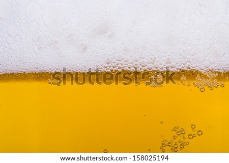 Close up, macro view of droplets, beer bubbles.