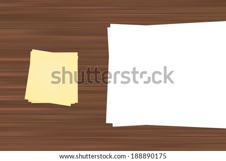 Yellow sticky post and blank white note paper for your message or design on wooden table.