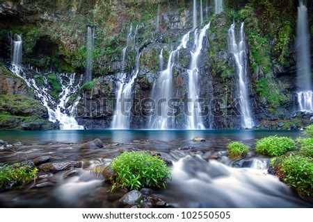 Panoramic view of waterfall on river Langevin in tropical jungle, Reunion Island.