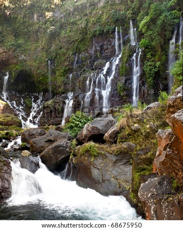 Scenic view of picturesque waterfalls on river Langevin, Reunion Island.