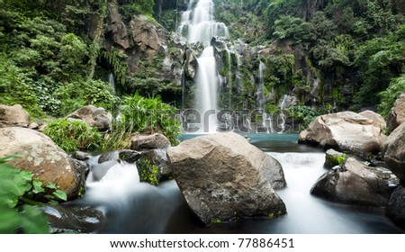 Slow shutter for moving water at Trois Bassin waterfall on Reunion Island
