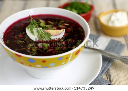 beet soup with egg, cucumber and dill