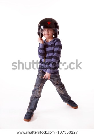 Young boy pilot in black helmet with red star on white background