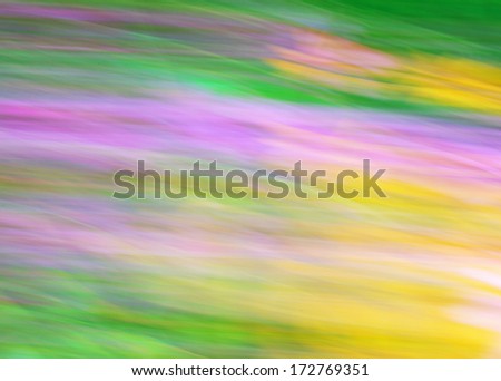 Photo art, bright Colorful light streaks abstract background in yellow, purple and green colors