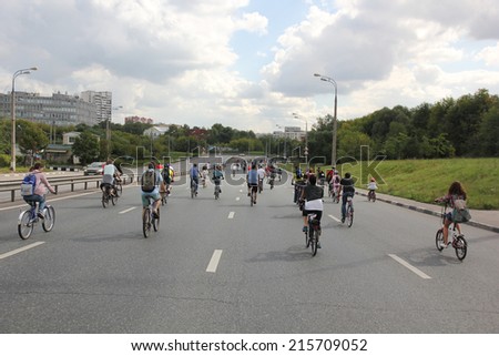 MOSCOW - SEPTEMBER 07: Unidentified people ride bicycles at the \
