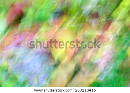 Photo art, bright Colorful light streaks abstract background in yellow, green, red