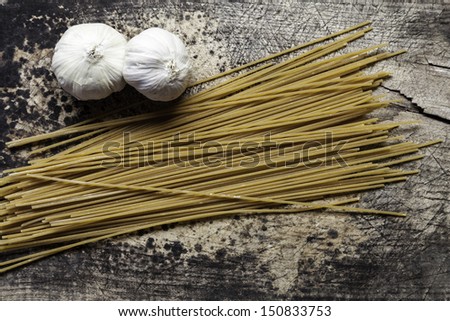 whole wheat pasta on a wooden table
