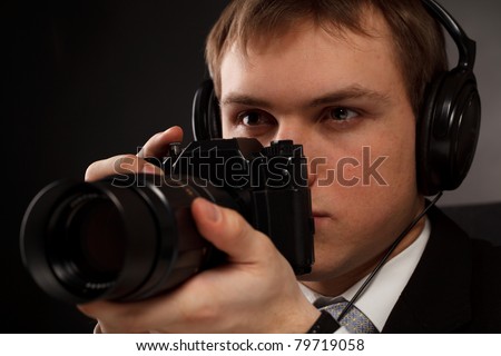Spy with camera.