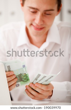 happy businessman with cash money