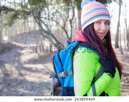 Close up portrait of woman hiking in the forest