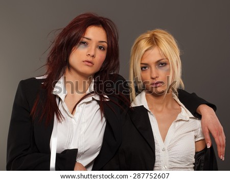 Portrait of two business woman after fight for job interview