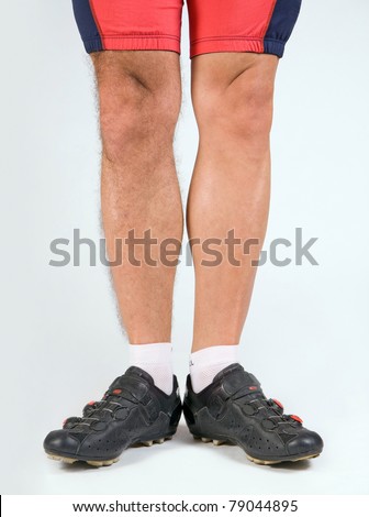 cyclist with a half-shaven legs