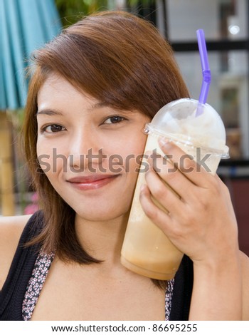 Drinking Iced Coffee