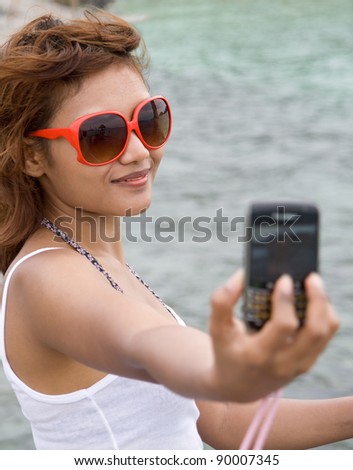 Young woman take photography self portrait