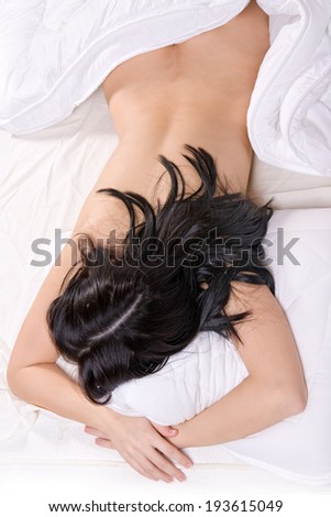 Beautiful naked woman sleep on bed