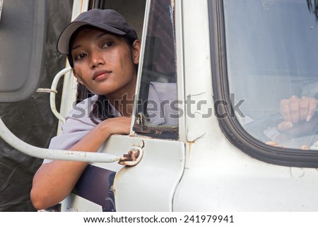 Asian woman truck driver.