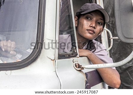 woman truck driver in the car