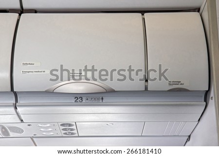Overhead compartment -  airplane cabin interior