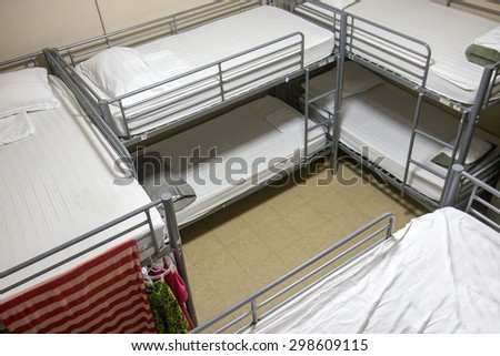 room with eight bunk beds in the hostel
