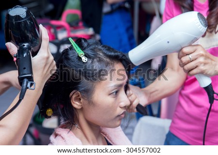 woman sitting in a hairdressing salon