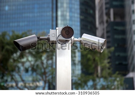 monitoring cameras on the streets of Singapore
