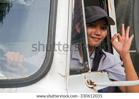woman truck driver in the car