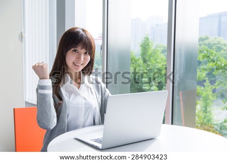 Asian woman with laptop