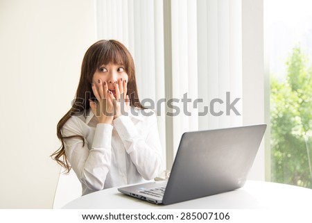 A asian woman with laptop