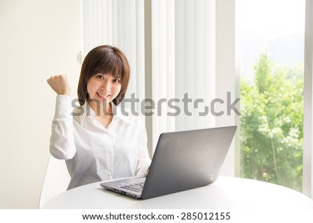 A asian woman with laptop