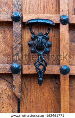 wood panels with an old vintage door lock