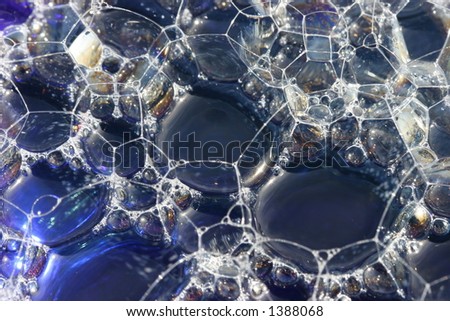 Macro of blue bubbles or suds.
