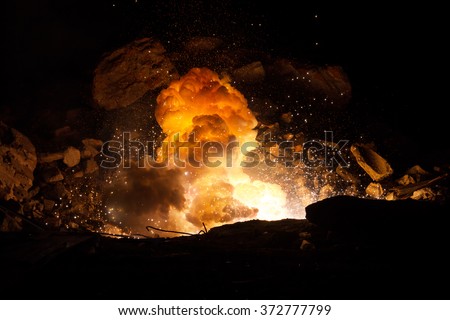Explosion on the battlefield. Realistic fiery explosion inside an old ruined hall