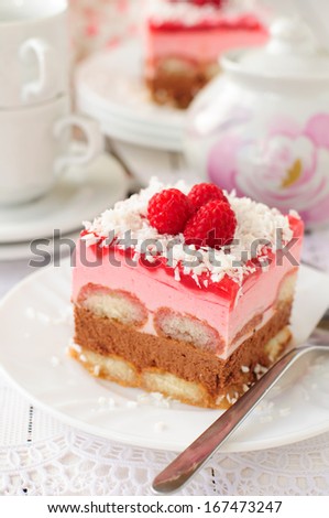 A Piece of No Bake Layer Cake (Savoiardi Soaked in Raspberry Liqueur, Chocolate Mousse, Raspberry Mousse and Raspberry Jelly), copy space for your text