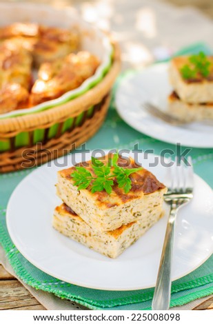 Savory Cheesecake (Cottage Cheese Bake) with Herbs (Dill, Parsley and Chives), copy space for your text