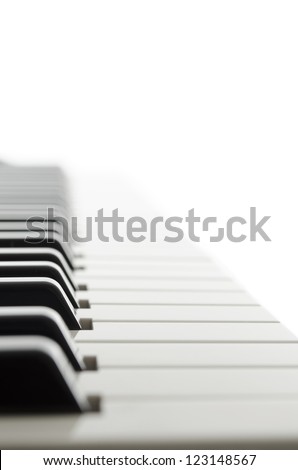 Side view of electronic piano keyboard keys.