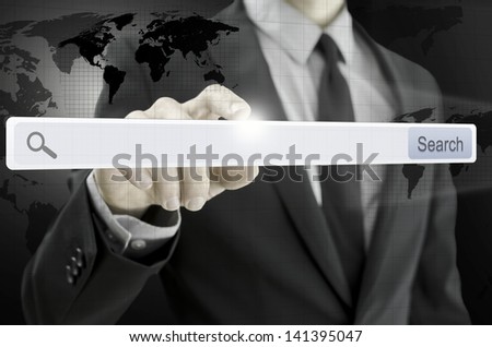 Closeup of businessman pointing at search bar on virtual screen.