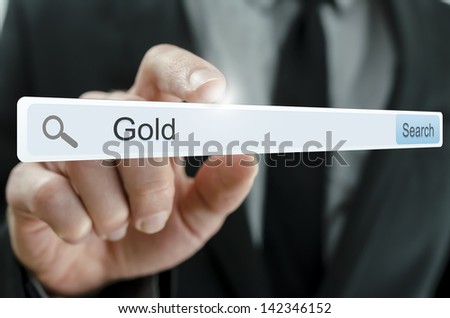 Word Gold written in search bar on virtual screen.