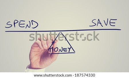 Conceptual retro image of whether to Spend or Save your Money with a man drawing a diagram of a seesaw on a virtual screen balancing the two concepts of - Spend - Save - in equilibrium.