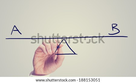 Conceptual retro image of whether to choose plan A or plan B with a man drawing a diagram of a seesaw on a virtual screen balancing the two letters A and B.
